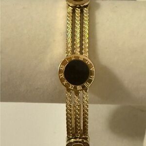 Gold and Black Braided Bracelet with Gemstone Halo